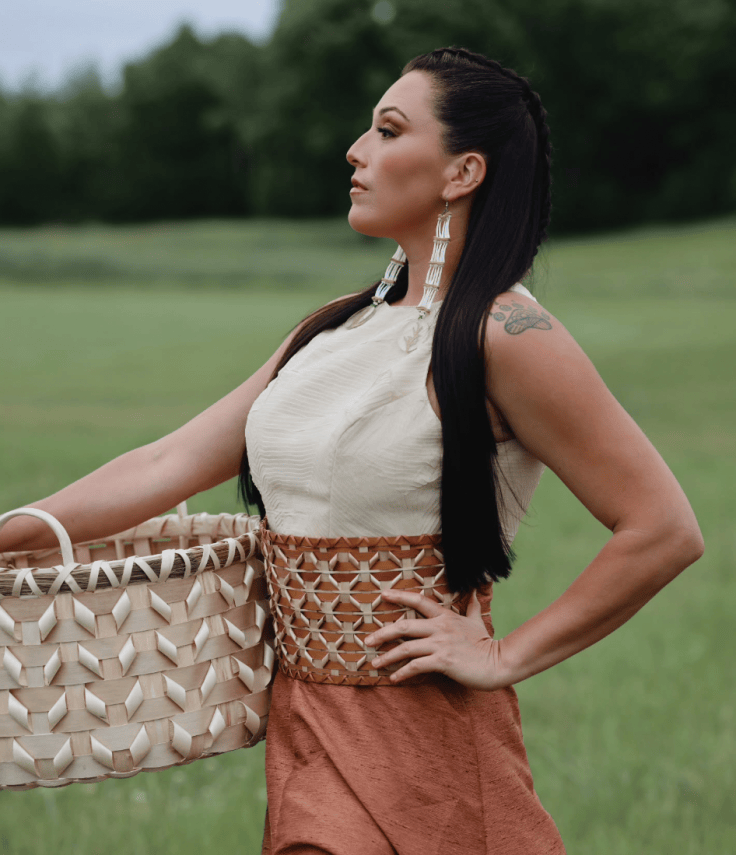 Model Steevi King is holding a weaved basket (Courtesy of Stacey Mitchell on Instagram)